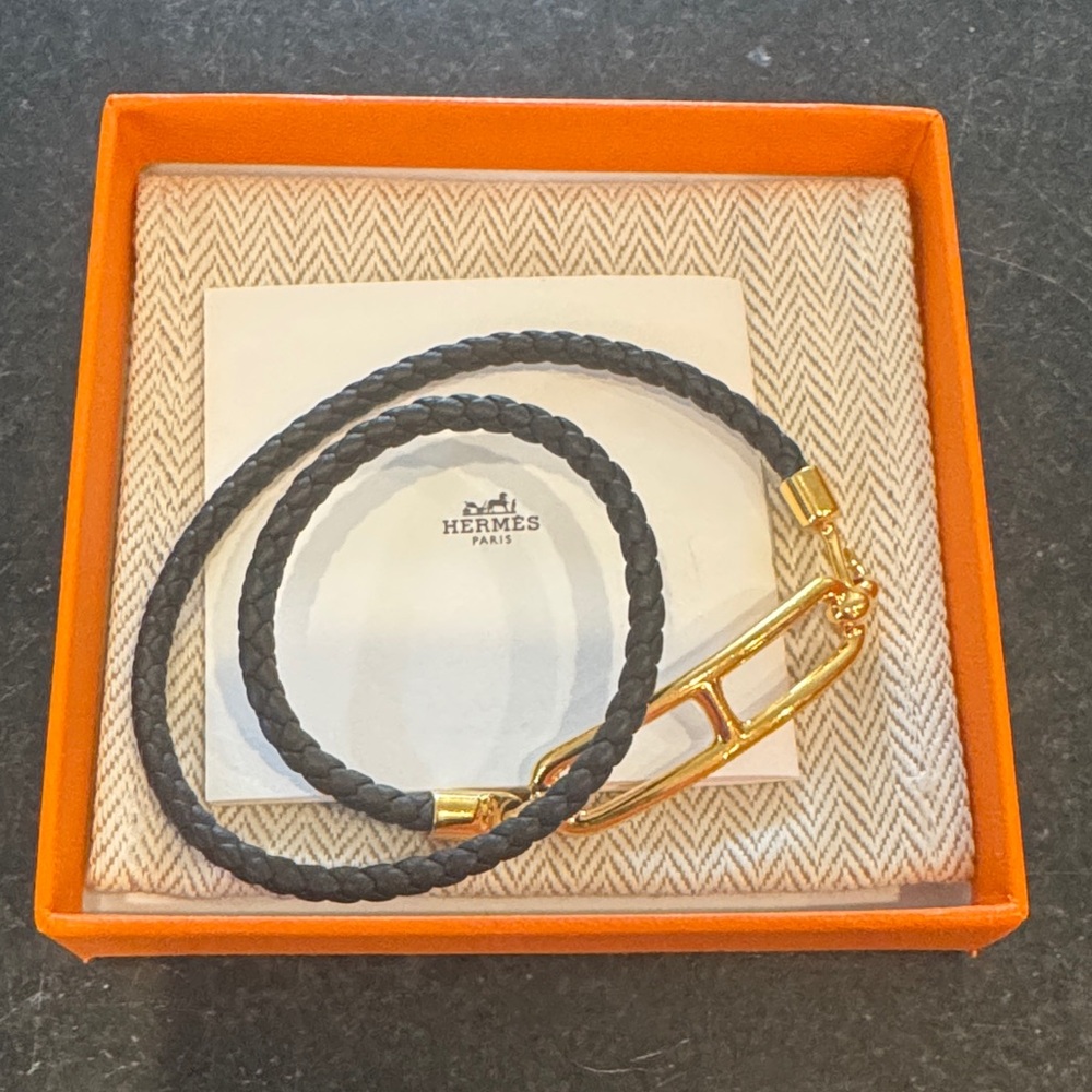 Roulis Double Tour Hermès Black and Gold Bracelet